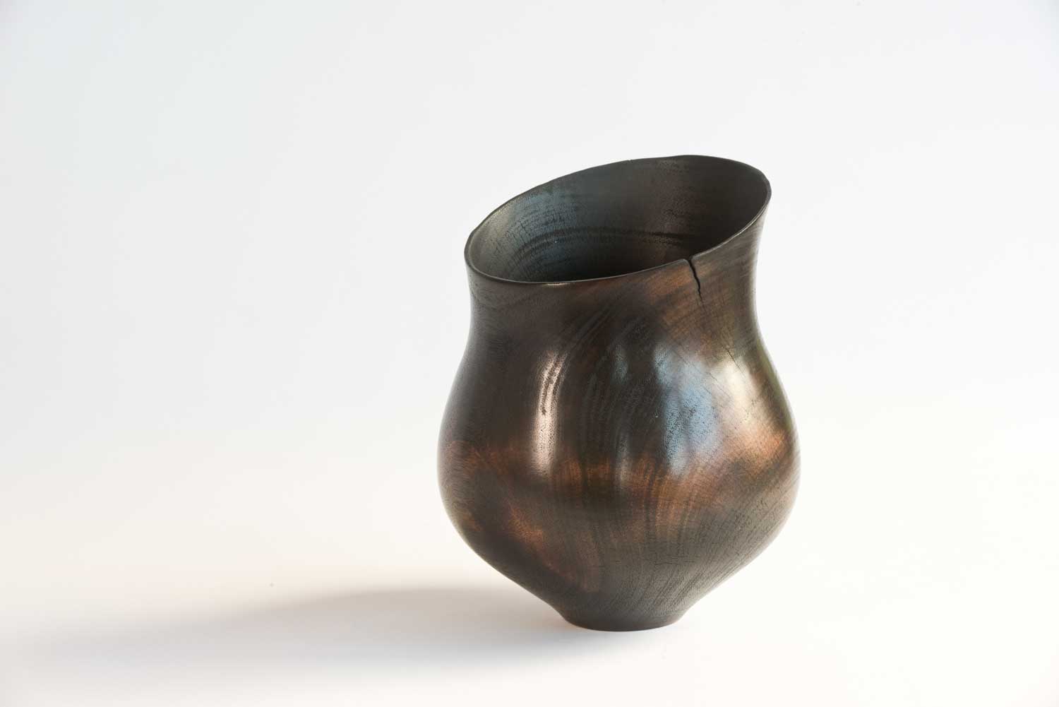 Turned-Wooden-Vessel-BB13-c Hollowed wooden vessel with natural grain showing beneath fire-blackened finish.
